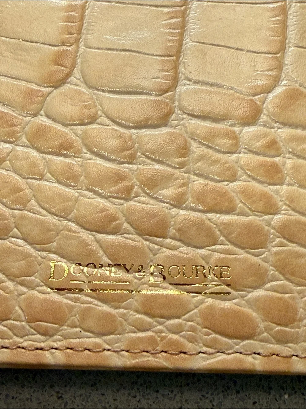 Dooney & Bourke portable note holder